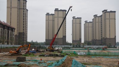 中国最大民营房企碧桂园，位于天津的住宅建筑工地。（图取自路透社）