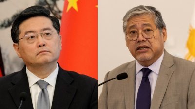 中国国务委员兼外长秦刚（左）将于周五访问菲律宾，并与该国外长马纳洛举行会谈。（图取自路透社档案照）