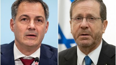 比利时首相德克罗（左）向以色列总统赫尔佐格（右）重申，必须停止杀害加沙平民。（图取自法新社）