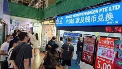 截至12月15日，新加坡警方接获超过670起汇款至中国后，银行户头被冻结的案件，其中430起与山立汇款公司有关。 （档案照）