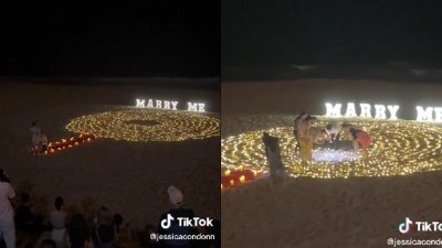 男子在海滩向女友求婚时，不小心把婚戒掉进沙堆里，亲友见状赶紧上前帮忙找回婚戒。