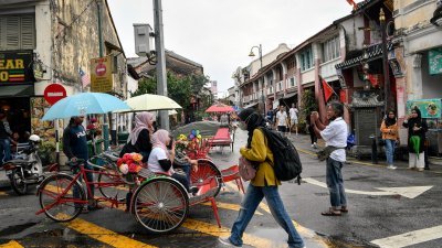 联邦政府在2023年财政预算案，宣布拨出5000万令吉的款项，以协助乔治市和马六甲的文化遗产保护工作。