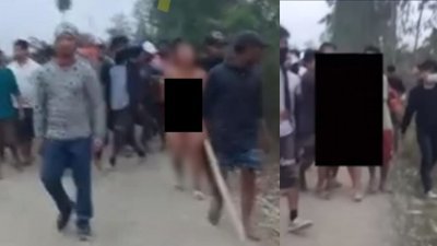 印度曼尼普尔邦周三传出一段视频，视频内2名女性被一群男性挟持裸体游街并强力拖至田野内。（图取自网络）