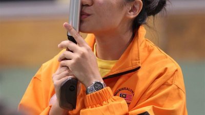资深射击选手黄佩琴为终于获得杭州亚运会的参赛资格而松了一口气。