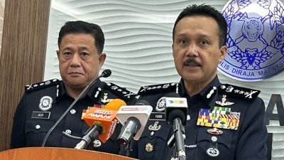 尤斯里（右）指出，霹雳警方接获20宗相关投报，此案件交由武吉安曼警察总部展开调查。