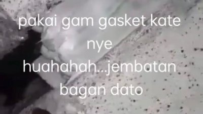 网民拍摄视频质疑峇眼拿督大桥是因使用垫片构造才会出现断层和坑洞。（视频截图）