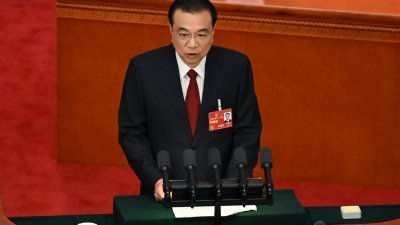 全国人大会议周日在北京人民大会堂举行开幕会，中国总理李克强在会上发表政府工作报告。（图取自法新社）