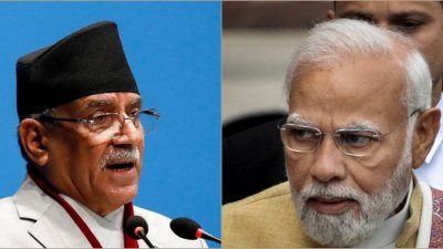 尼泊尔总理普拉昌达（左）将从本月31日开始，对印度进行为期4天的访问，届时将与印度总理莫迪举行会谈。（路透社档案照）