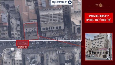 以军发布的视频截图显示，加沙北部第2家主要医院圣城（al-Quds）医院的门口有一群男子，其中一人似乎携带火箭推进式榴弹发射器。（图取自X/Israel Defense Forces）