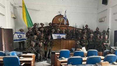 以色列安全内阁部长卡茨在社交平台X（前推特）分享照片，显示一群士兵在加沙议会厅举著以色列国旗的照片，他写道：“哈马斯统治加沙的象征在我们戈兰尼（Golani，特种部队）手中。 在追捕到恐怖分子和杀手前，我们不会停止。”（图取自X/Israel_katz）