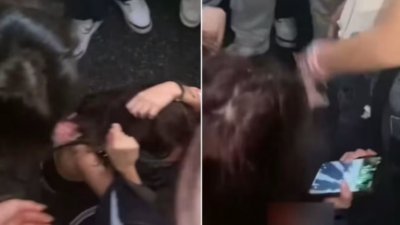面子书流传影片显示，4名少女对一名长发女生拳打脚踢。