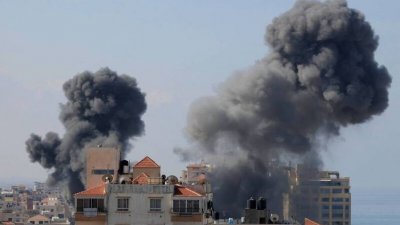 以色列反击空袭加沙走廊，造成至少198名巴勒斯坦人丧命、1610人受伤。（法新社图）