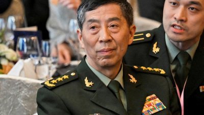 中国国防部长李尚福周二被免去国务委员、国防部长职务。（图取自路透社）