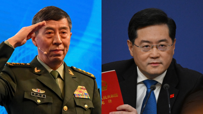 中国国防部长李尚福（左）周二遭免职，并与中国前外交部长秦刚一同被免去国务委员职务。（法新社档案照）