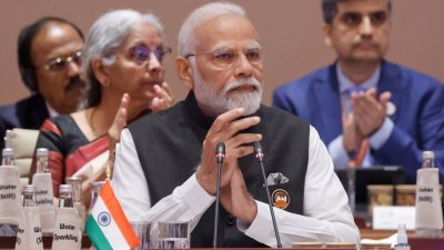 印度总理莫迪在G20峰会上使用的桌签，国名为“巴拉特”而非“印度”。（图取自法新社）