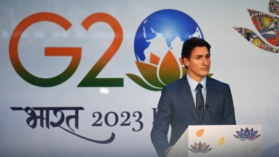 加拿大总理特鲁多上周日在印度新德里出席G20峰会闭幕后举行新闻发布会。（图取自法新社）