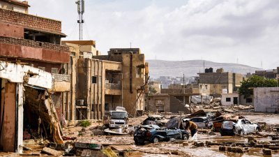 利比亚东部城市德尔纳，当地时间周一有1/4面积遭洪水淹没。（图取自利比亚总理新闻办公室/法新社）