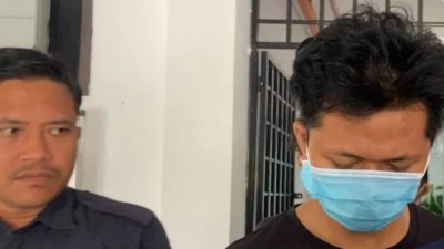 被告莫哈末哈山努丁（右）一天内连干下3宗破门行窃案，最终难逃法网，遭判处监禁一年8个月。（图取自大都会日报）
