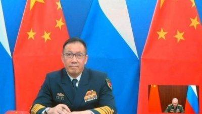 中国新任防长董军在上任1个月后首度有公开活动，周三与俄国防长绍伊古视频会晤。（图取自网络）
