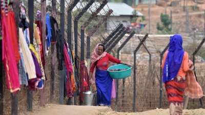 印缅边境自由流动制度允许居住在边境附近的民众可以无需签证，即可进入对方领土16公里。（图取自法新社）