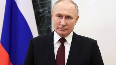 俄罗斯总统普京在莫斯科克里姆林宫，发表祖国卫士日致词。（图取自法新社）