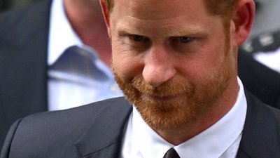 图为去年6月，英国哈里王子离开位于伦敦市中心的英国皇家法院。（法新社档案照）