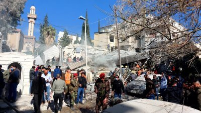 叙利亚首都大马士革一栋建筑，周六在以色列袭击中被摧毁。（图取自法新社）