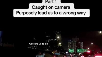 网民在社交媒体控诉，驾驶新加坡车出境新山时，被警员引导驶入罗里车道，最终驶入禁区，遭警方索讨“咖啡钱”。(视频截图)