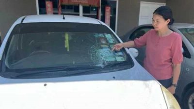 公正党英特拉加央岸州议员颜艾菱停放在住家轿车遭不明人士掷砖块，导致挡挡风镜破裂！