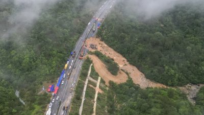 广东梅大高速公路塌陷事故，截至周四下午2时，死亡人数增至48人。（图取自法新社）