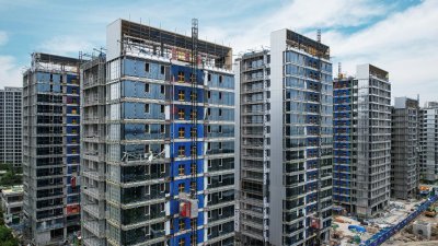 中国浙江省杭州市正在兴建的住宅大楼。（图取自法新社）
