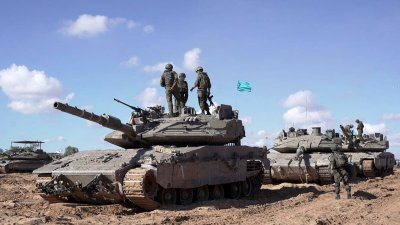 以色列军队于周五发布的照片显示，以色列的吉瓦蒂旅在加沙南部拉法东部执行军事行动。（图取自以色列军队/法新社）