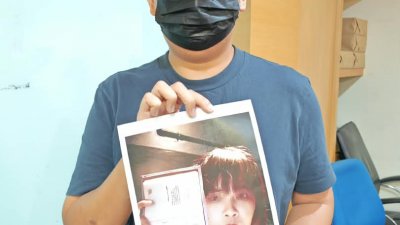 受害者林先生展示其泰国籍女友的照片，目前该女子已经失联并欠下“阿窿”。