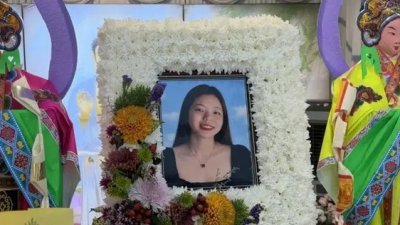 女死者陈美珍（译音）。