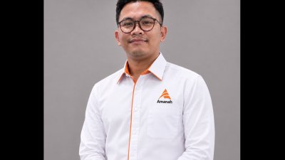 砂诚信党青年团团长再里阿都拉。