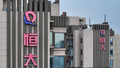 恒大物业（Evergrande Property）宣布，由清盘人代表的卖方与要约人订立购股协议，将出售合共约55亿1500万股股份，占公司已发行股份总数约51.016%。（法新社档案照）