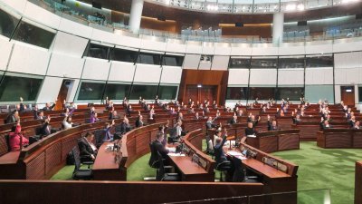 香港立法会在周二全票通过《维护国家安全条例》。（图取自中新社）