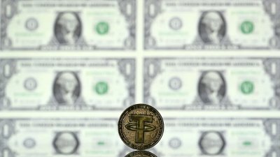 泰达币（USDT）的发行公司泰达（Tether），成为全球人均最赚钱公司。（图取自法新社）